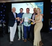 The Smart Garden team accept their award from Terry Mayhew and Marylin Monroe